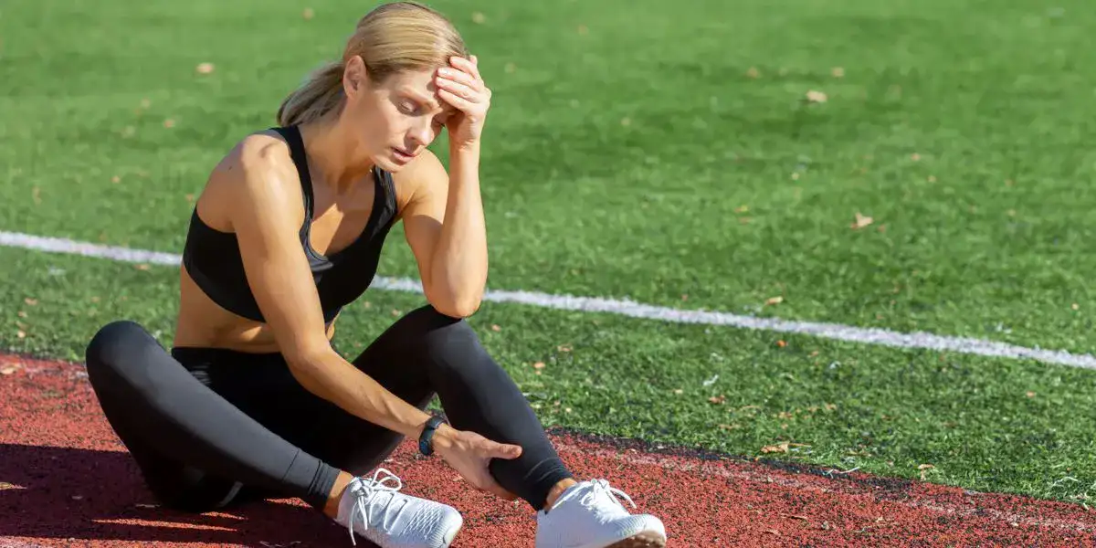 Desportista de elite com lesão por causa do stress
