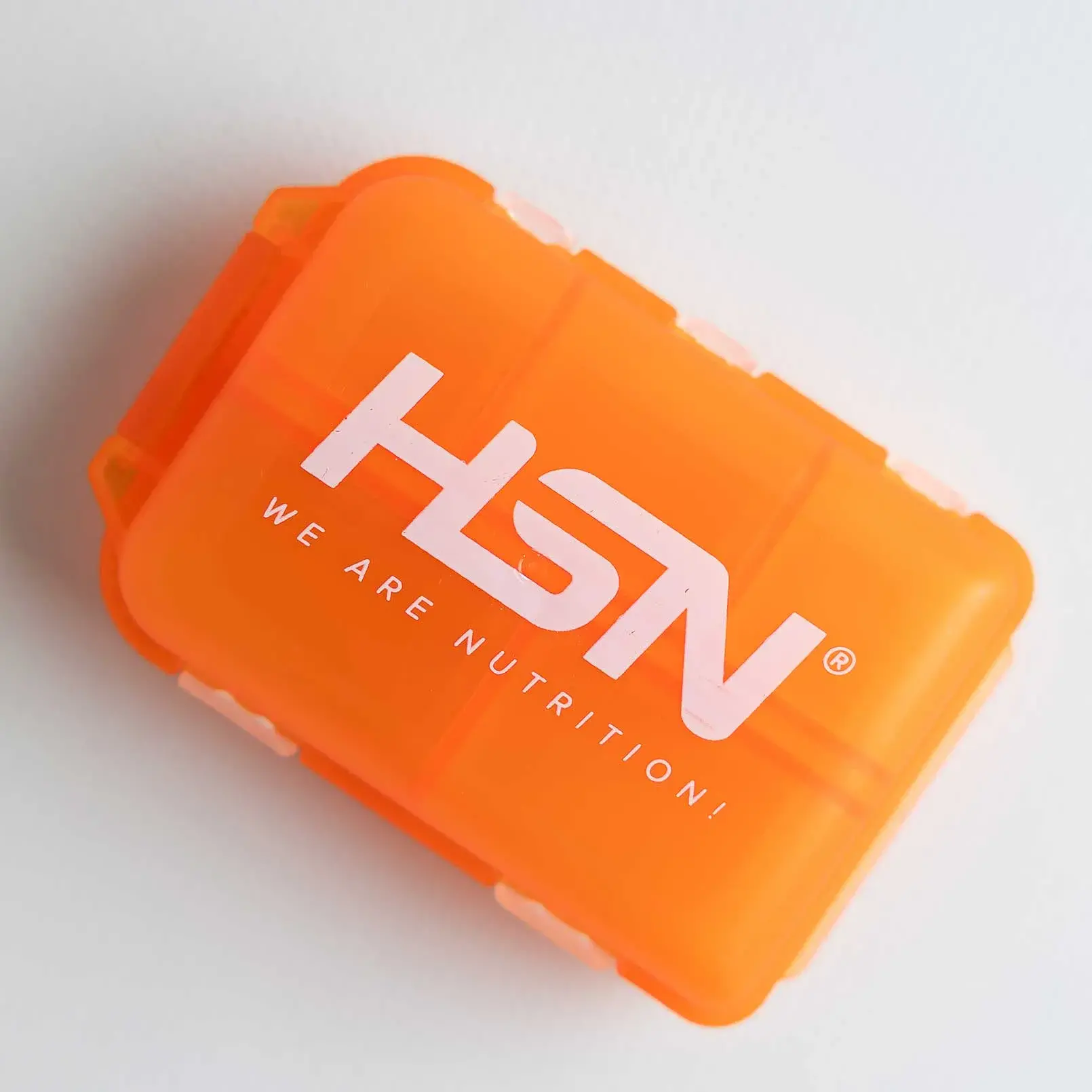 CAIXA DE COMPRIMIDOS HSN WE ARE NUTRITION! LARANJA